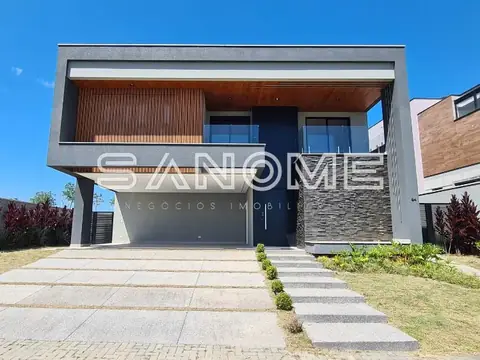 Fachada de casa moderna com garagem cinza