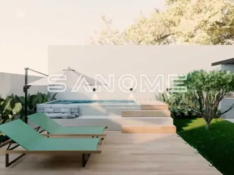 Terraço com espreguiçadeira e piscina