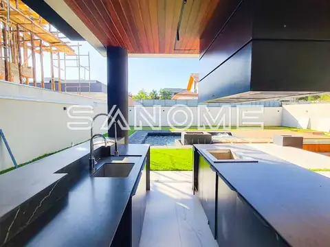 Cozinha aberta com vista para área externa