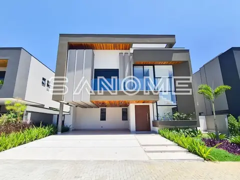 Fachada de casa moderna com garagem e entrada principal