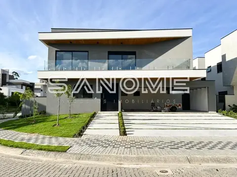 Fachada de sobrado moderno com garagem integrada