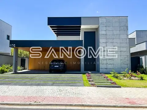 Fachada de casa moderna com garagem integrada