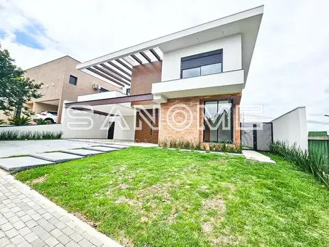 Fachada frontal de casa moderna com garagem